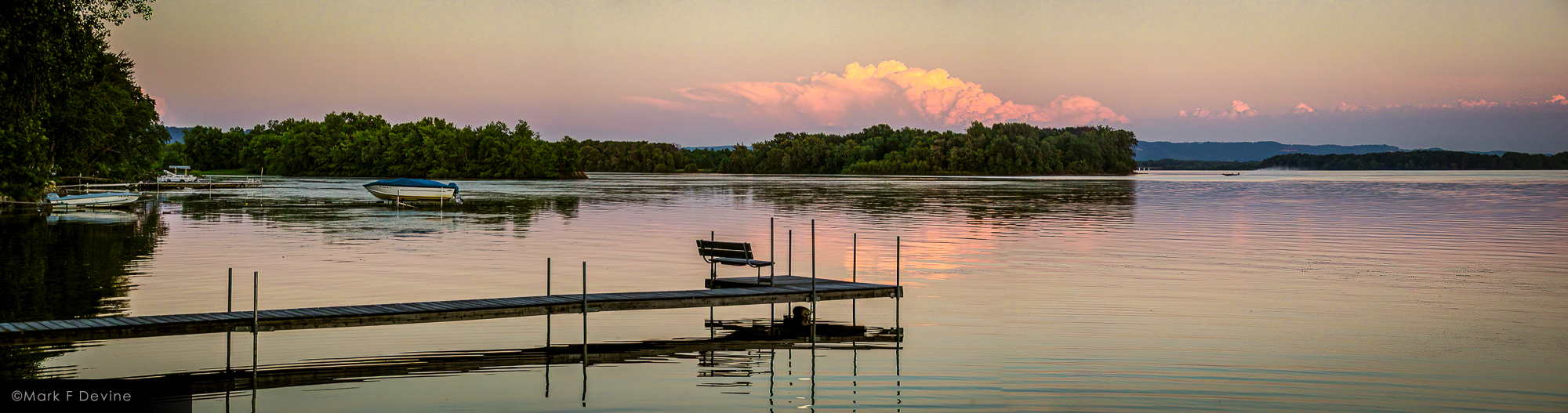 Sunset on Lake Onalaska. Storm clouds to the south.