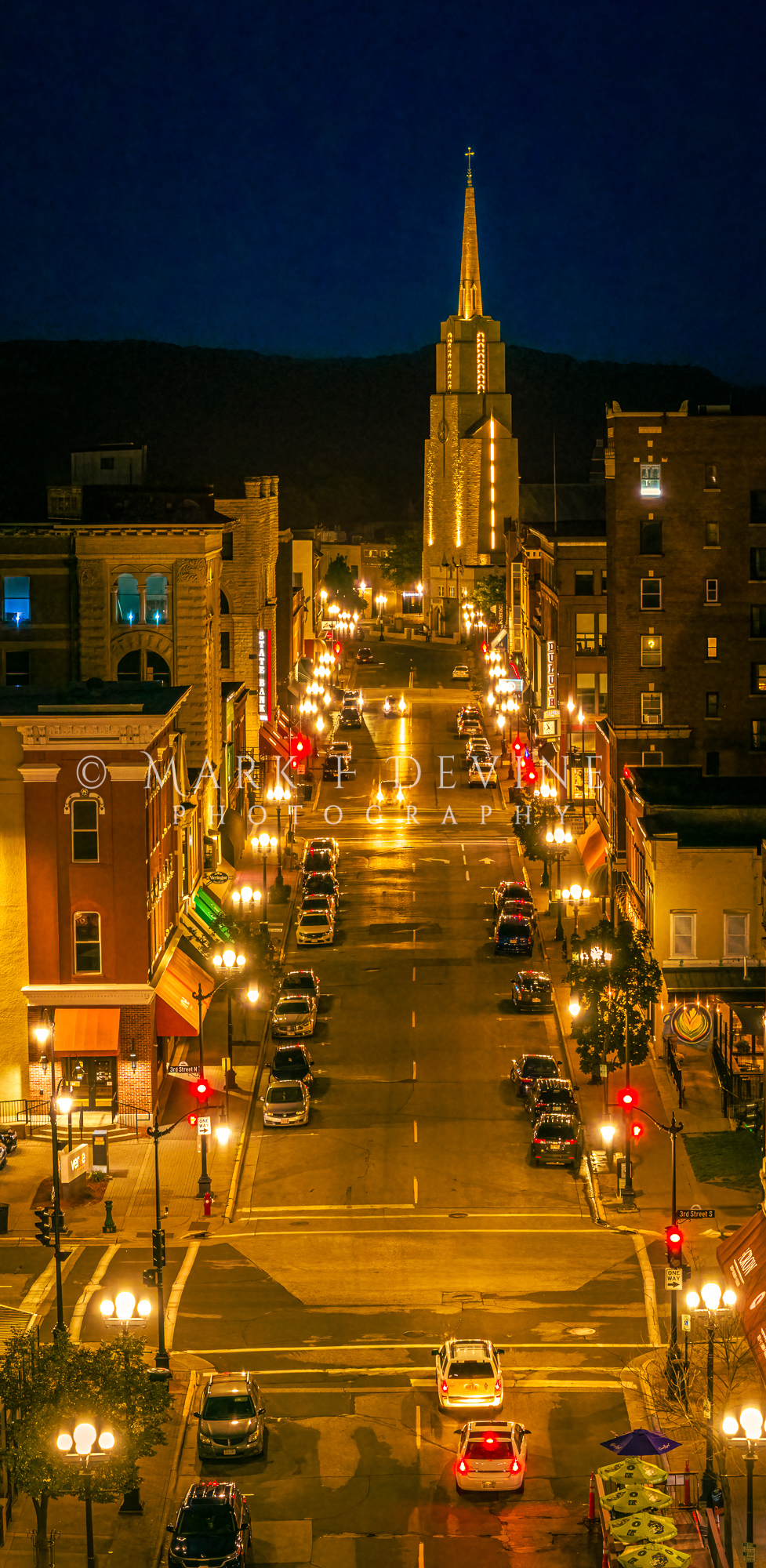 Nighttime panoramic aerial image of the merchants along Main Street in La Crosse, Wisconsin.