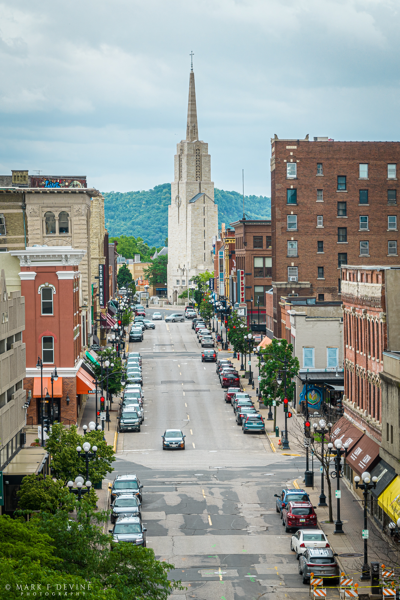Aerial view along Main Street in La Crosse, Wisconsin from Second Street to Sixth Street. Saint Joseph the Workman Cathedral...
